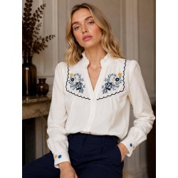 Camisa blanca bordados...